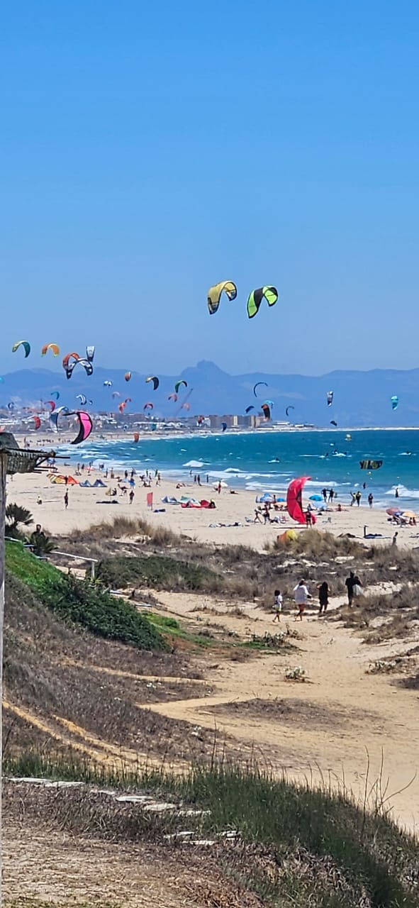 Kitesurfing on Los Lances Beach in Tarifa, the kitesurf capital of Europe