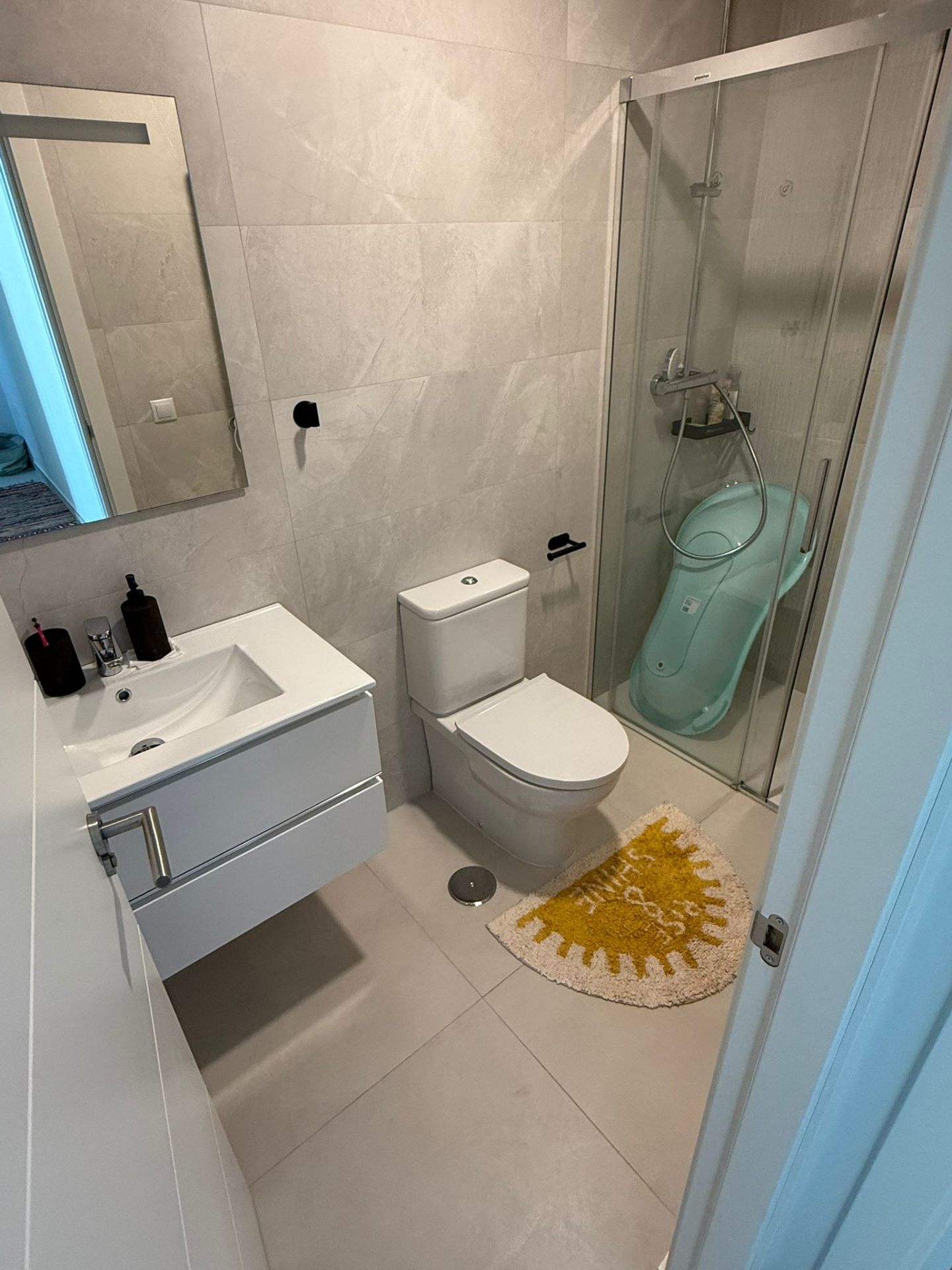 Contemporary bathroom with walk-in shower in modern Tarifa townhouse